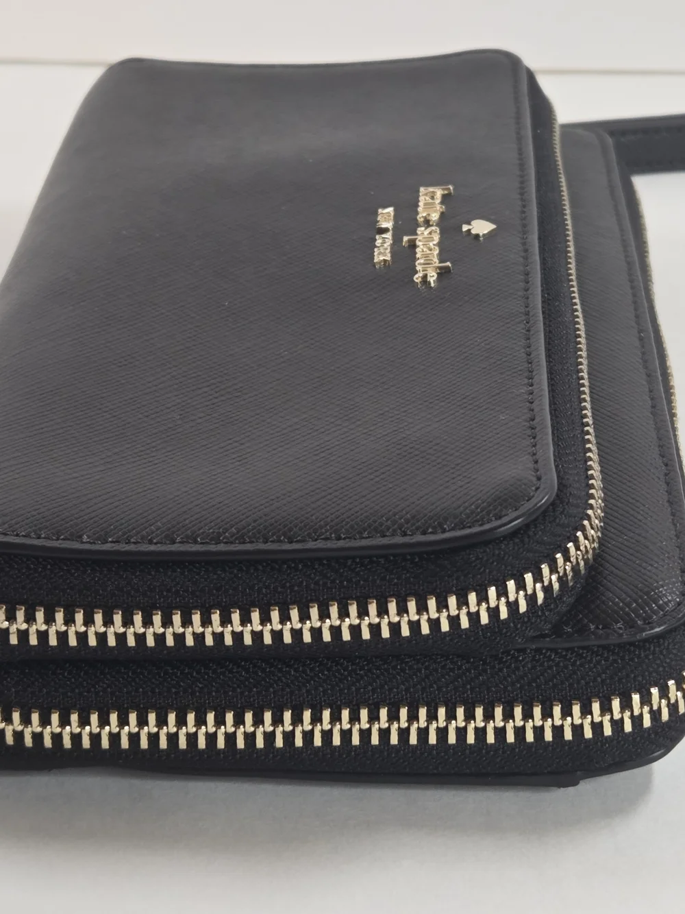 kate spade New York Black Saffiano Wristlet with Gold Logo